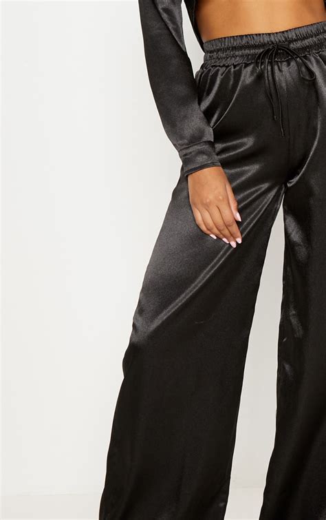 Black Satin Drawstring Wide Leg Pants Prettylittlething Qa