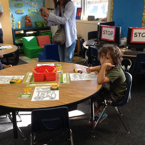 Boy Sitting Chair Holding Crayon Child Pupil Bored Classroom