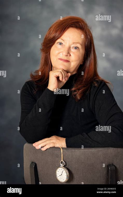 Portrait Of Stylish Adult 60s Year Old Woman On Grey Background Confident Stylish European