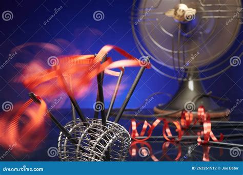 Antique Fan Blowing Red Ribbons Stock Photo Image Of Performance