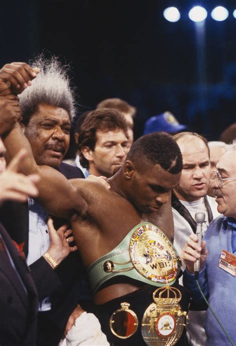 ♡♥mike Tyson Wearing His Winners Belts Has His Arm Lifted In Victory By