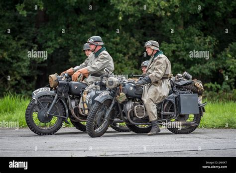 German Ww2 Soldiers Riding On Two Bmw Military Motorcycles With Sidecar During World War Two Re