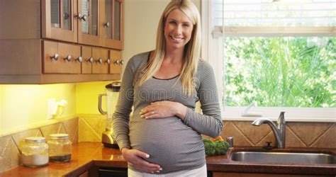 Beautiful Pregnant Woman Standing In Kitchen Stock Image Image Of Home Hand 47557565