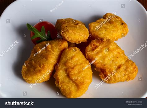 Chicken Nuggets Heap Served Cherry Tomato Stock Photo 1174340665