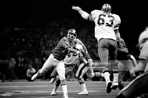 Quarterback Norris Weese Of The Denver Broncos Throws A Pass While