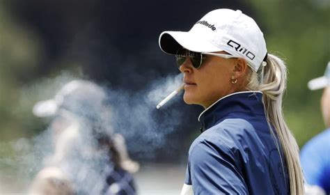 Charley Hull Signs A Fans Cigarette After Smoking On The Golf Course