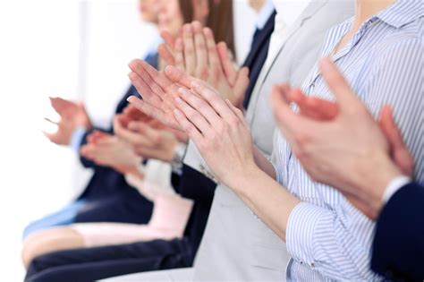 Premium Photo Close Up Of Business People Hands Clapping At Conference