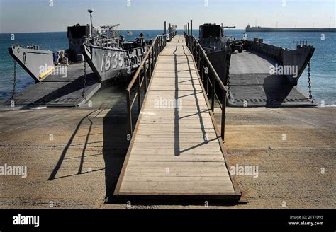 Us Navy Two Landing Craft Utility Lcu Wait To Be Loaded With Supplies Bound For The Amphibious