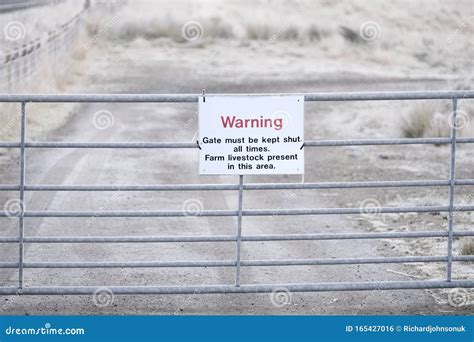 Keep Gate Latched Sign On Metal Fence Stock Photo Cartoondealer