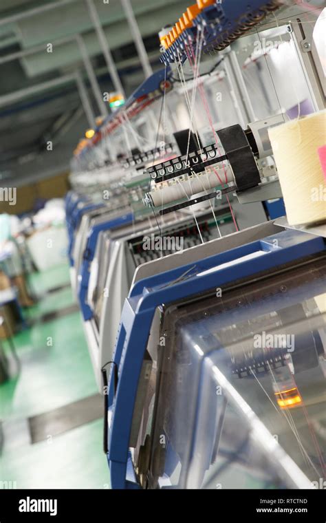 Textile Industry With Knitting Machines In Factory Stock Photo Alamy