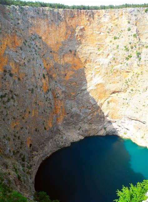 Red Lake In The Crater Of An Extinct Volcano, Croatia.. Stock Image ...