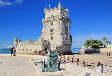 The Replica Of Belem Tower In Front Of The Iconic Belem Tower Lisbon