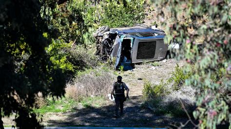 Tiger Woods accident: Photos from the scene of Woods' single-car crash