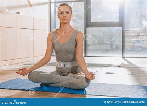 Woman Meditating in Lotus Yoga Pose with Mudra Stock Photo - Image of ...