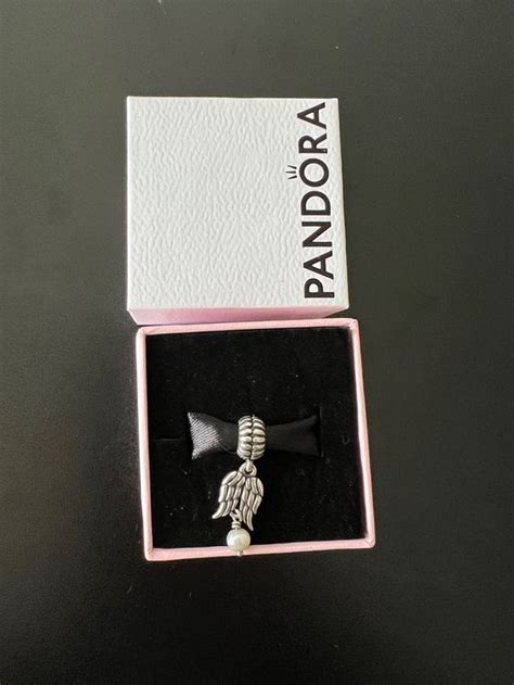 Original Pandora Charm Flügel mit Perle Kaufen auf Ricardo