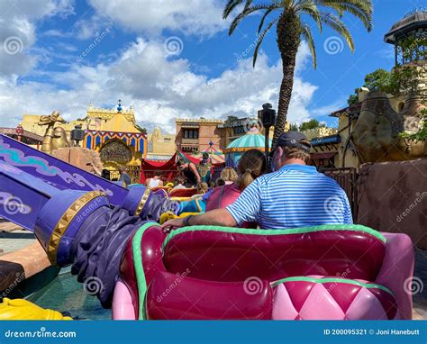 People Riding The Aladdin Magic Carpet Ride At Disney World Editorial