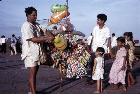 Man selling toys at Gateway of India 1962 : r/mumbai