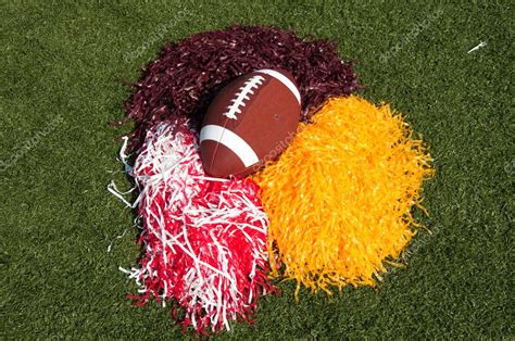 American Football And Pom Poms On Field Stock Photo By ©dehooks 3693760