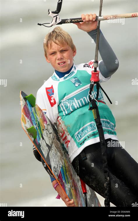 The competition's youngest participant, Olly Bridge from Great Britain, rides a wave in St ...