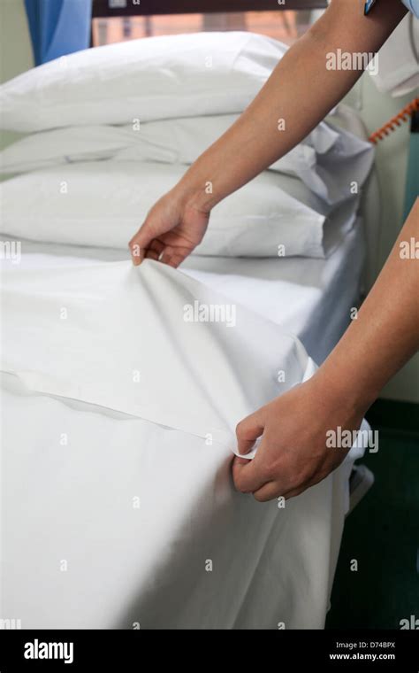 Making Bed Sheets Hi Res Stock Photography And Images Alamy