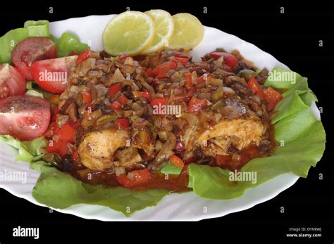 Baked Fish With Vegetables On White Plate Stock Photo Alamy