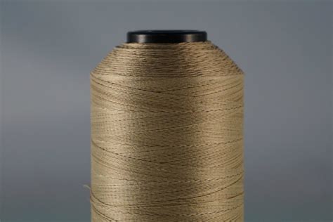 R721 Series PTFE Coated Para Aramid Sewing Thread With Stainless Steel