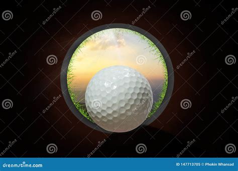 Golfer At Golf Ball View From Inside The Hole Of Cup In The Green Golf