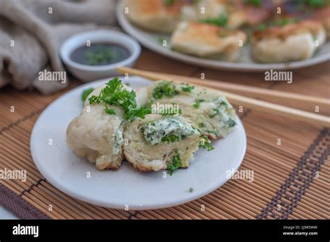 Shanghai Pan Fried Pork Dumpling With Wild Garlic Stock Photo Alamy