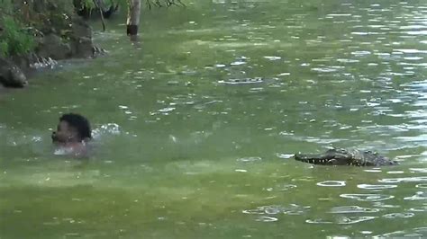 Guy Pranks Swimmer with Remote-Controlled Alligator | The Weather Channel