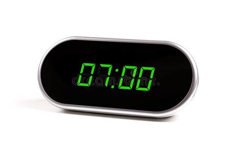 Digital Alarm Clock With Green Digits Royalty Free Stock Photo - Image: 25639495