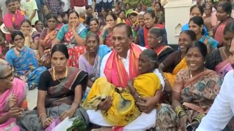 Telangana Minister Malla Reddy Makes Elderly Woman Sit On His Lap In