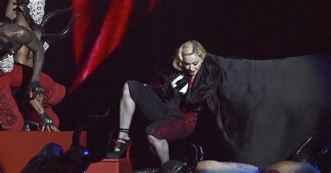 Madonna falls off stage during Brit Awards performance