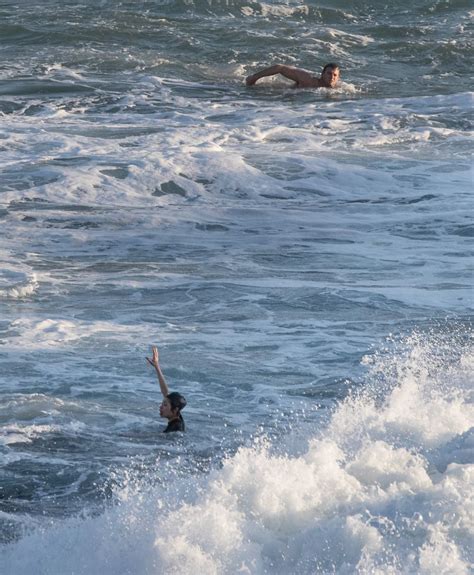 Dramatic Sea Rescue As Swimmer Saved By Lifeguards Seconds Before She