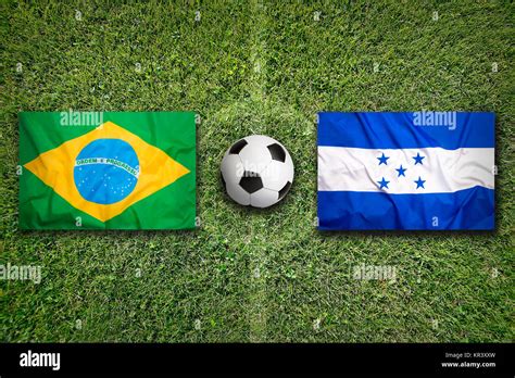 Brazil Vs Honduras Flags On Soccer Field Stock Photo Alamy