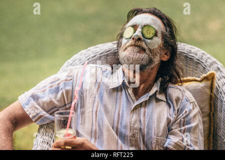 Old Active Bearded Man Taking Selfie With Mobile Phone Isolated On