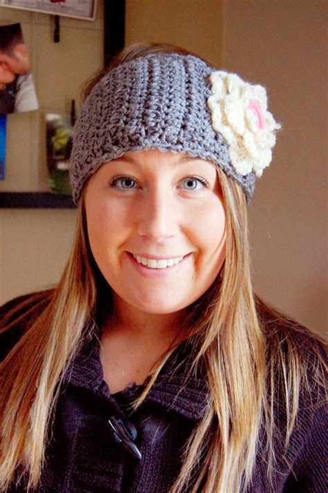 Items similar to Crochet Ear Warmers with Flower on Etsy