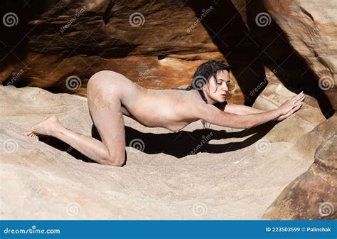 Happy Lifestyle Naked Woman Resting Near Shell Rock Caves Stock Image