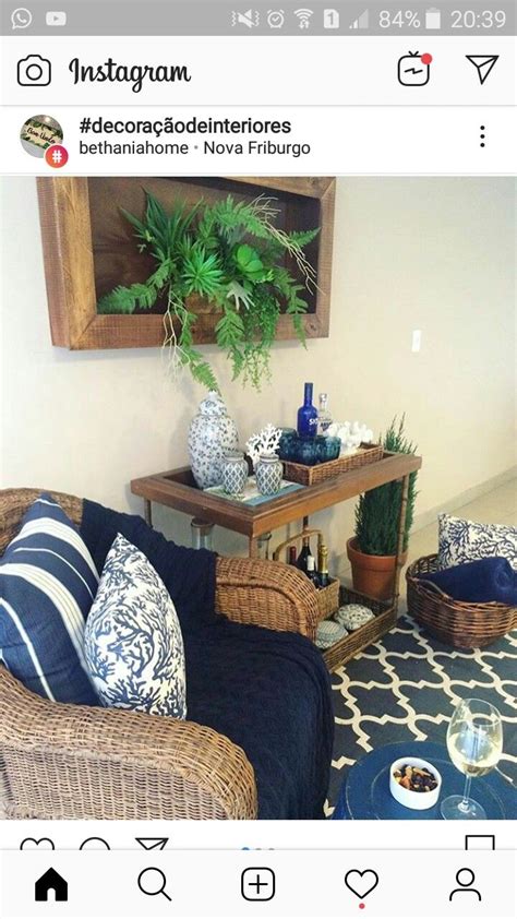 A Living Room Filled With Furniture And Plants