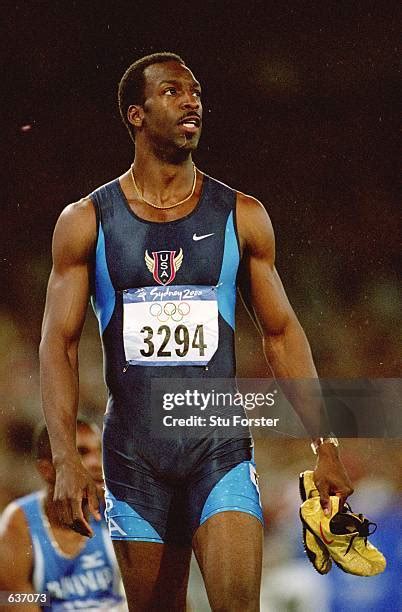 81 Michael Johnson Gold Shoes Photos & High Res Pictures - Getty Images