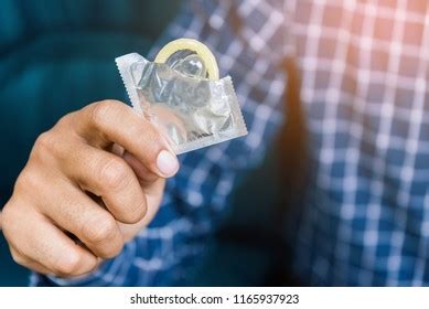 Male Hand Holding Condom Safe Sex Stock Photo Shutterstock