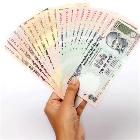 Hand Holding Indian Five Hundred Rupee Notes Stock Photo By