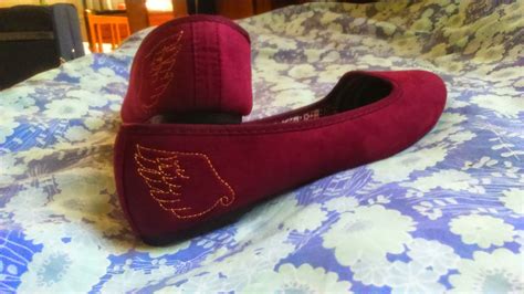 trashy elegance: embroidered hermes wing shoes