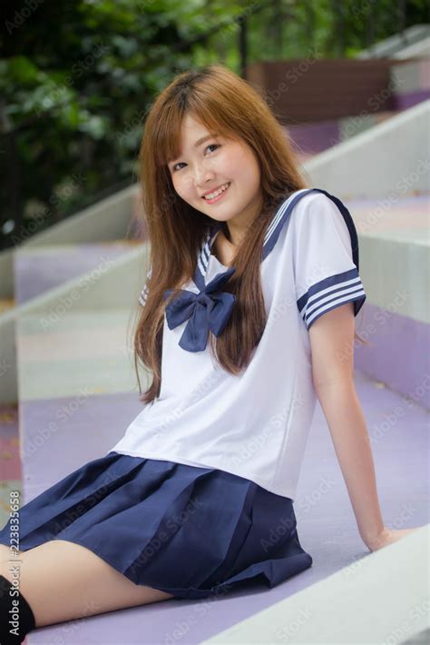 Portrait Of Thai Teen Beautiful Girl In Japanese Student Uniform Happy