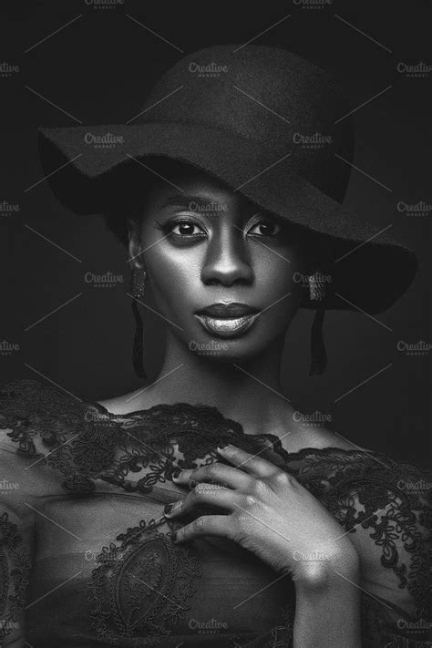 Beautiful Young African Woman Wearing Large Black Hat Beauty Portrait