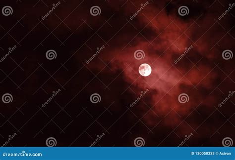 Full Moon Covered Red Clouds In The Night Sky Stock Image Image Of