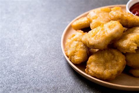 Chicken nuggets with sauce stock photo. Image of meal - 153427662