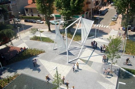 An Aerial View Of People Walking And Riding Bikes