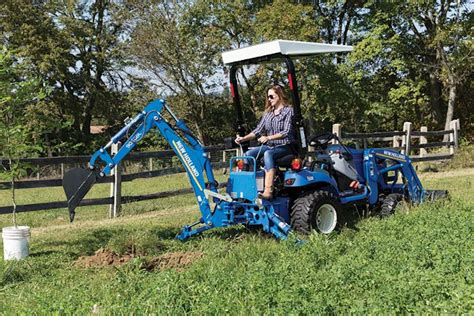 New Holland WORKMASTER 25S Open-Air + 100LC LOADER + 905GBL BACKHOE ...