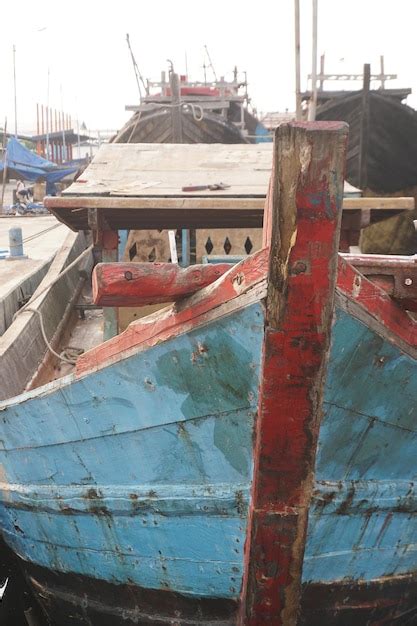 Premium Photo | A collection of old wooden ships visible from the front