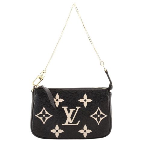 Louis Vuitton Pochette Accessoires Bicolor Monogram Empreinte Giant